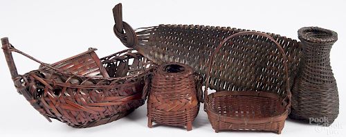 Four Japanese bamboo ikebana baskets, to include one ship-form basket, 10 1/4'' h., 16'' l.
