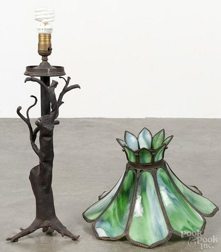 Welded metal tree-form table lamp with a green slag glass shade, 28'' h. Provenance: DeHoogh Gallery