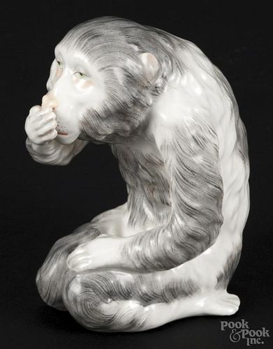 Meissen style porcelain figure of a kneeling monkey, 19th c., 4 1/8'' h. Provenance: DeHoogh Gallery