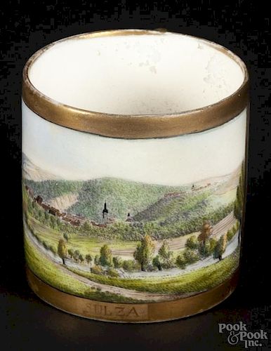 German painted porcelain tea cup, 19th c., gilded and featuring a scenic view of Sulza at front