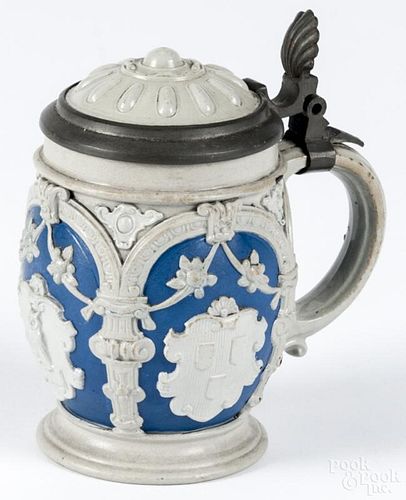 German beer stein, 19th c., with pewter hardware and relief decoration