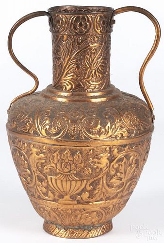 Italian chased and embossed copper armorial vase, 17th/18th c., 13 3/4'' h. Provenance: DeHoogh Gallery