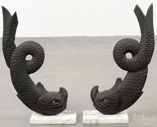 Pair of American carved and painted wooden dolphin architectural elements, ca. 1820, mounted