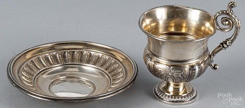 French Rococo style silver tea cup and saucer, 19th c., 5.55 ozt. Provenance: DeHoogh Gallery