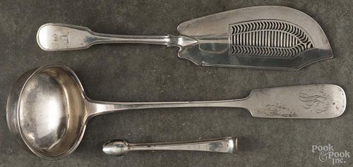 Three silver serving utensils, to include a silver ladle, an English sterling fish server