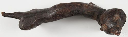 Carved folk art otter, 19th/20th c., with painted details, 8 3/4'' h., 20'' l.