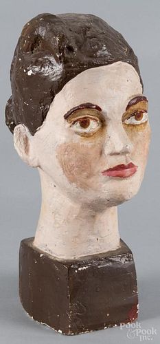 Painted plaster sculpture of a woman's head, mid 20th c., 17'' h. Provenance: DeHoogh Gallery