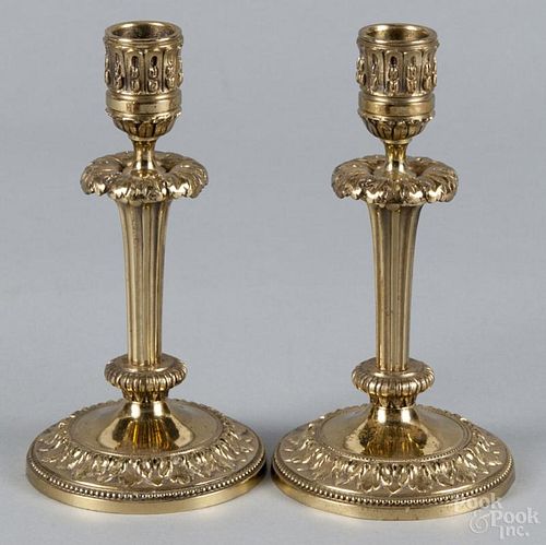 Pair of Charles X style gilt bronze candlesticks, 7'' h. Provenance: DeHoogh Gallery, Philadelphia.