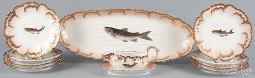 Limoges ten-piece fish service, early 20th c., to include a platter, 23 1/2'' w., a gravy boat