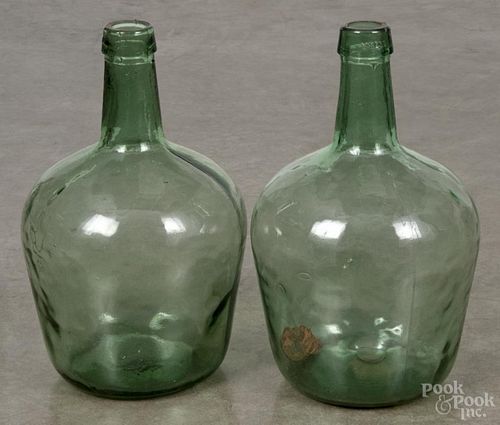 Pair of green pressed glass demijohn bottles, marked VIRESA, 12 1/2'' h. Provenance: DeHoogh Gallery