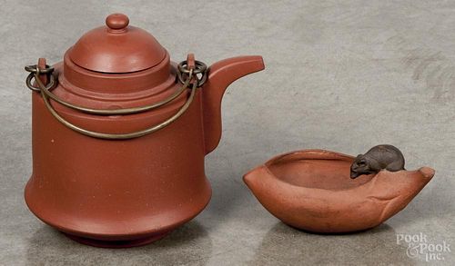 Chinese Yixing clay teapot with metal handles, 6'' h., together with a red clay fruit-form dish