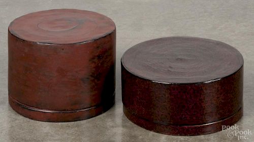 Two Burmese lacquered wood circular covered boxes, 19th c., with interior trays, 3 1/2'' h., 8'' dia.