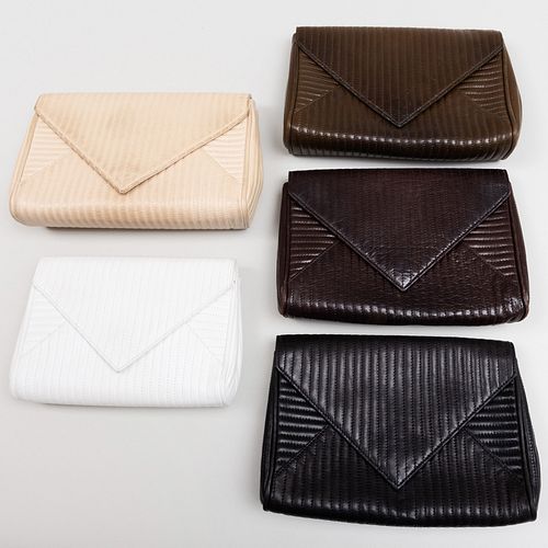 Group of Five Yves Saint Laurent Leather Clutches