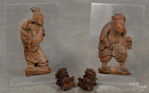 Pair of Chinese carved wood figural plaques of a man and woman, 10 1/2'' h.