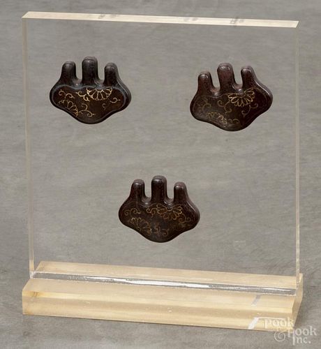 Set of three Japanese iron decorative elements, likely nail covers, with gilt detailing, 2 1/2'' h.