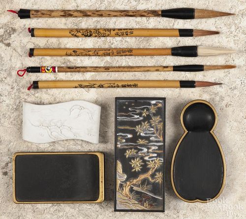 Chinese calligraphy implements, to include five bamboo brushes, three ink sticks