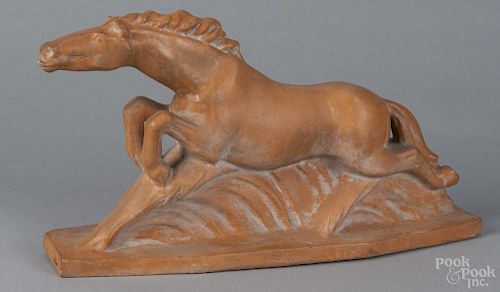 Lejan redware figure of a running horse, 20th c., 19 1/2'' w. Provenance: DeHoogh Gallery, Philadelphia