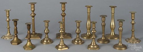 Seven pairs of brass candlesticks, 19th/20th c., tallest - 10 1/2''.