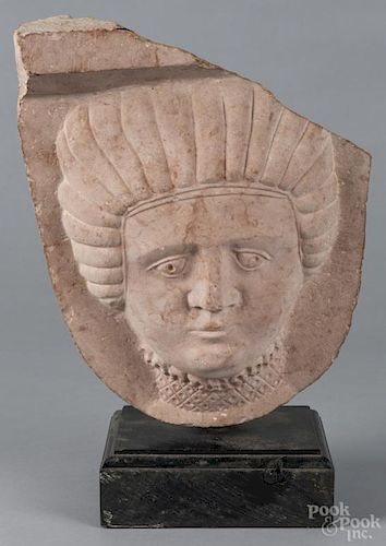 Carved stone mask of a woman, 20th c., 16'' h. Provenance: DeHoogh Gallery, Philadelphia.