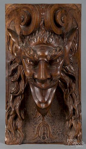 Carved mahogany devil mask, 19th c., 14'' h.