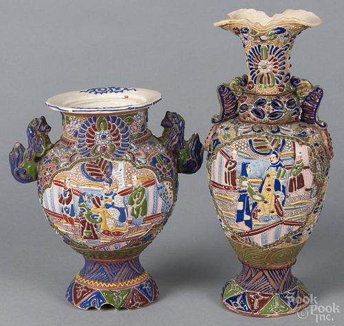 Four pieces of Japanese porcelain, to include two moriage vases and two bone plates
