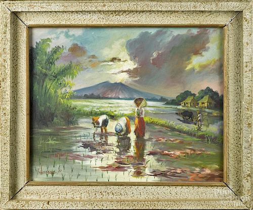 Oriental oil on canvas landscape, 20th c., with workers in a rice field, signed indistinctly