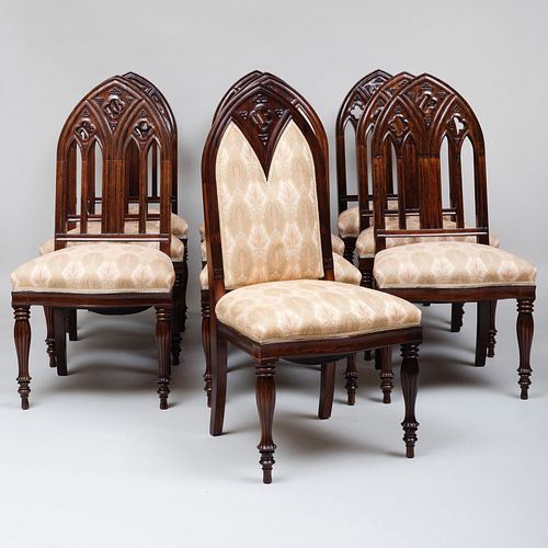 Set of Ten Continental Neo-Gothic Carved Rosewood Dining Chairs, Two of a Later Date
