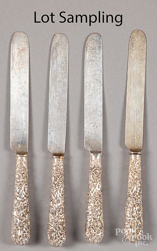Twenty-two sterling silver handled dinner knives