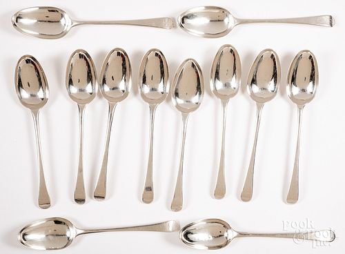 Set of twelve English silver serving spoons