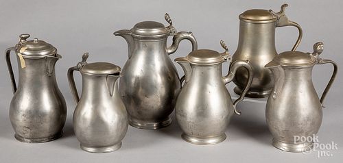 Six Continental pewter pitchers