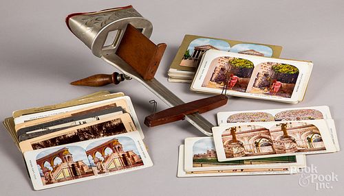 Hand held stereoviewer and cards.