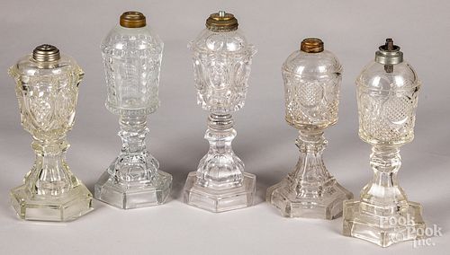 Five colorless glass fluid lamps, 19th c.