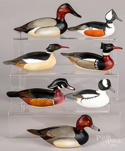 Seven Reineri carved and painted duck decoys