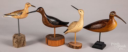Four carved and painted shorebird decoys