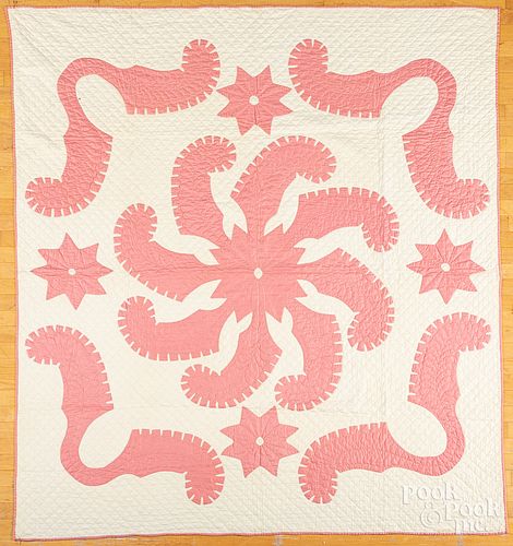 Two pink and white appliqué quilts, ca. 1900