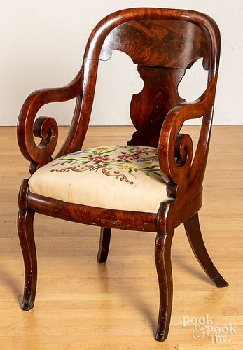 Classical mahogany sabre leg armchair, ca. 1830.