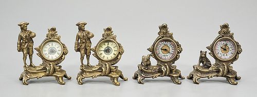 Group of Four Metal Clocks with Figures