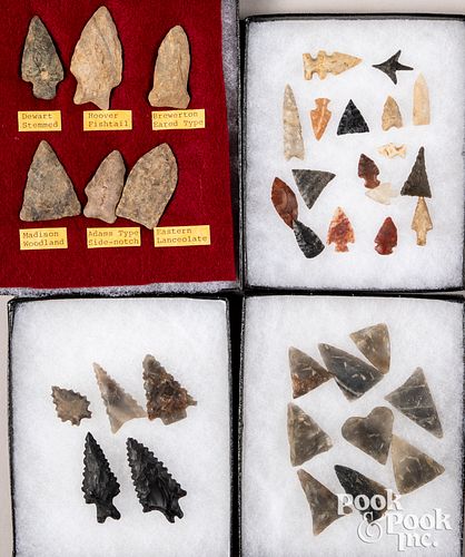 Four Riker mounts of stone points and arrowheads