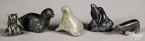 Five Inuit carved stone figures