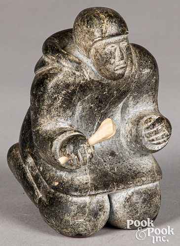 Salluit carved stone figure of a kneeling man