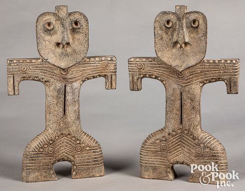 Pair of carved stone tribal figures
