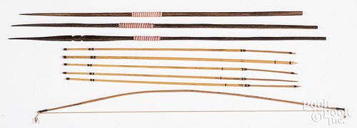Three Amazon fishing spears, bow and arrows