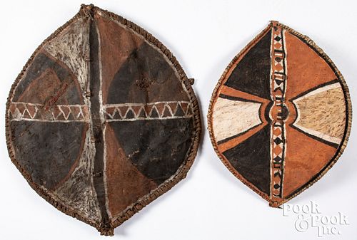 Two Tanzania Maasai painted hide shields
