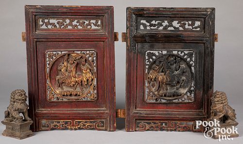 Pair of carved wood Chinese style foo dogs
