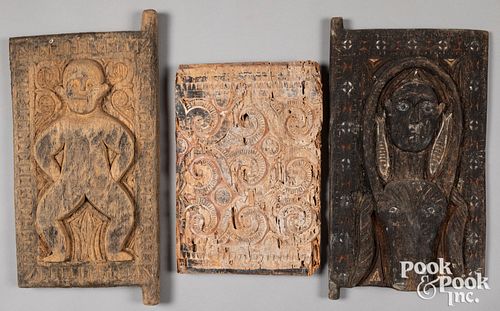Three Sulawesi carved wooden panels