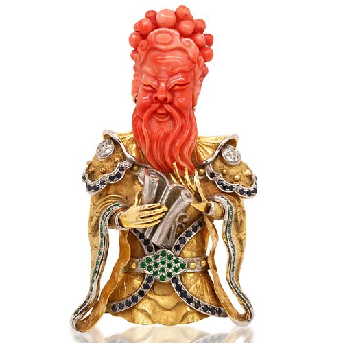 ASIAN GOD CORAL DIAMOND SAPPHIRE EMERALD GOLD BROOCH, CIRCA 1960S