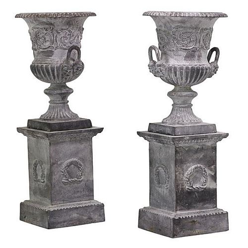 PAIR OF NEOCLASSICAL STYLE URNS ON PEDESTALS