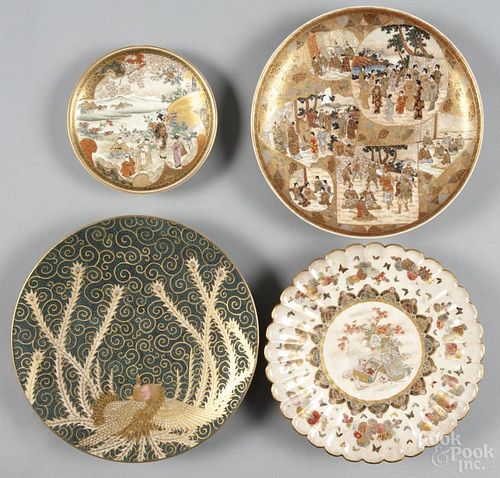 Four Japanese Satsuma plates, 19th/early 20th c., the largest with a gilt peacock