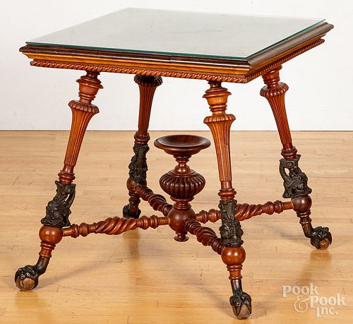 Victorian mahogany center table, with cast brass