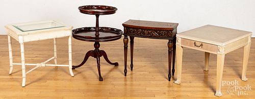 Four assorted tables, an ottoman, and a floor lam